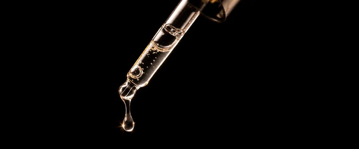 Finished serum drop on skin